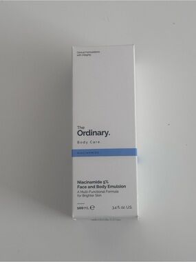 The Ordinary Niacinamide 5% Face and Body Emulsion - White with Blue Accent